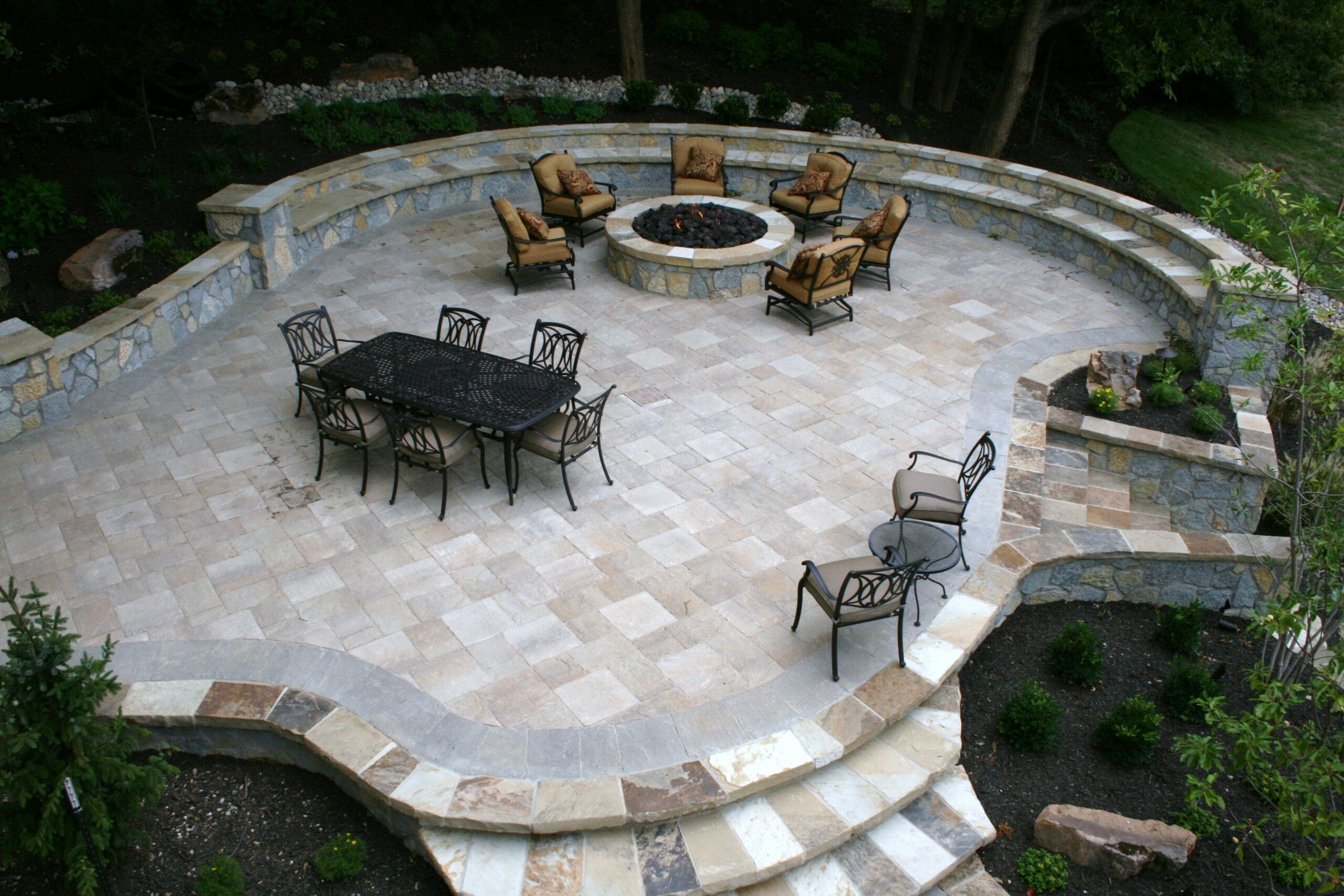 Firepit and multiple chairs and tables