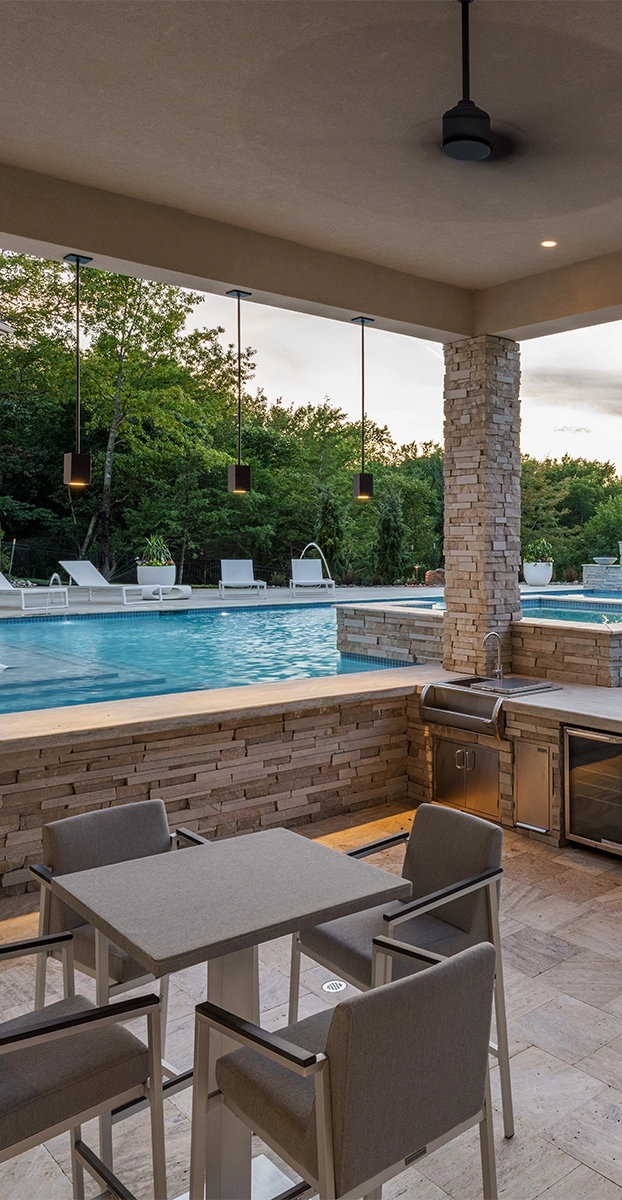 Outdoor pool with covered patio